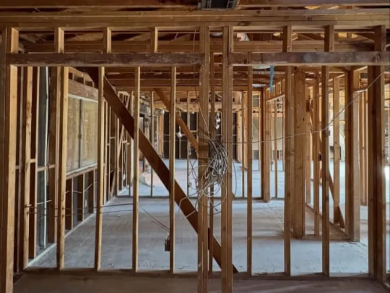 Wooden framing inside a house under construction.